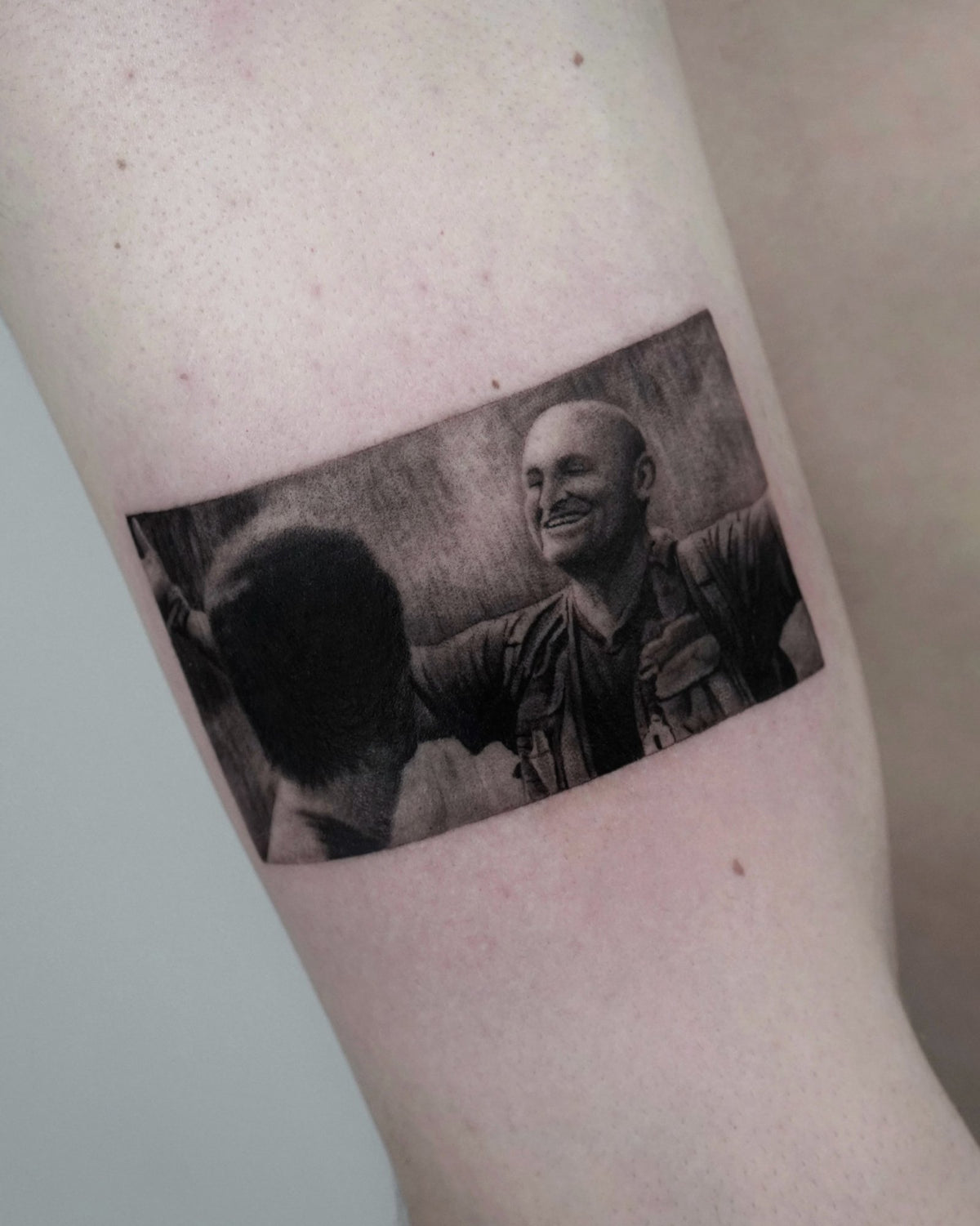 Microrealism tattoo of a film still by Fabio Pillon, The White Whale Tattoo Society, Milano